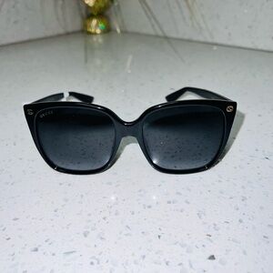 Gucci GG0022s-001 Black Oversized Sunglasses with Cat-Eye Design
